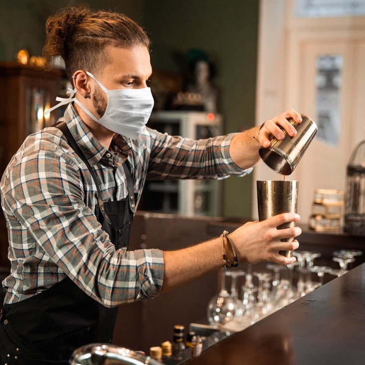 wearing cloth face mask at a bar