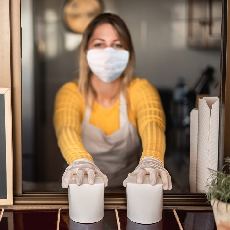 wearing cloth face mask at a food truck